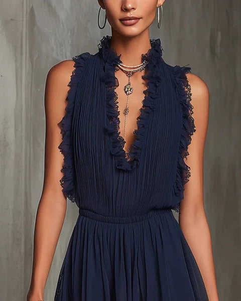 Adriana | Mono navy de gasa plisada con encaje